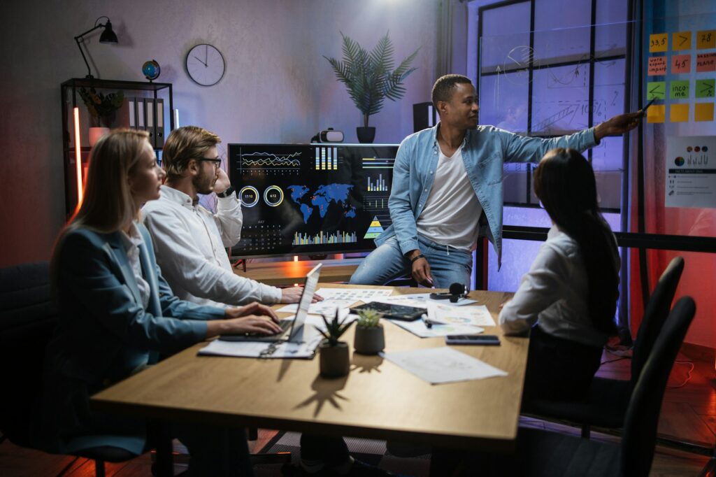 Multiracial financiers discussing company incomes at office